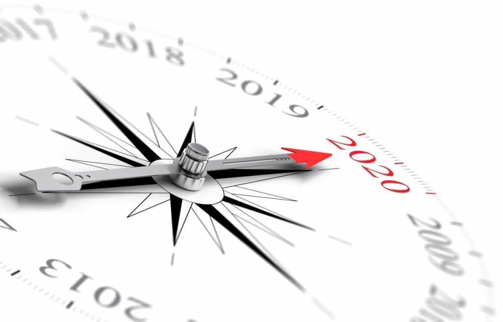 20-20 speaking illustrated by a compass with red arrow pointing to year 2020